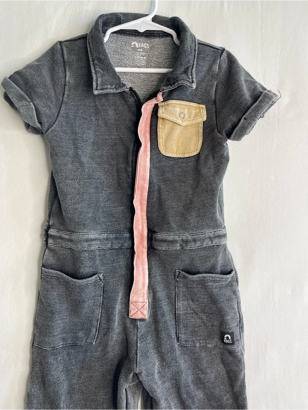 Rags to Raches Charcoal One-Piece Bodysuit with‎ Pink Zip and Tan Pocket